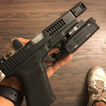 Glock 23 to 9mm KKM barrel conversion TBRCI Steiner Optics DBAL-PL Trijicon RMR06 ATEI Guns slide porting